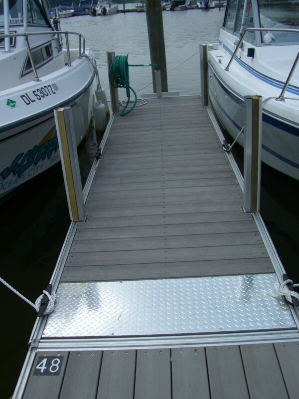 TechniDock aluminum composite floating dock with HDPE decking at marina