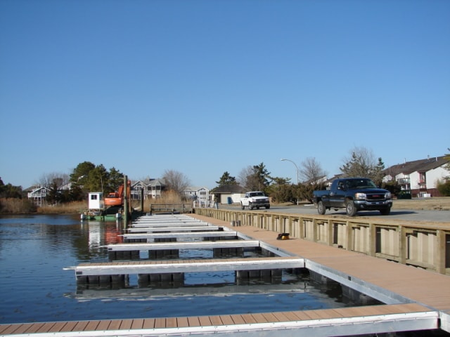 TechniDock aluminum composite floating dock with HDPE composite decking at waterfront