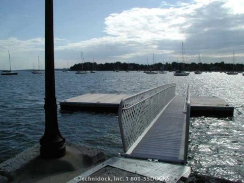 TechniDock ADA aluminum gangway with sailboats at marina