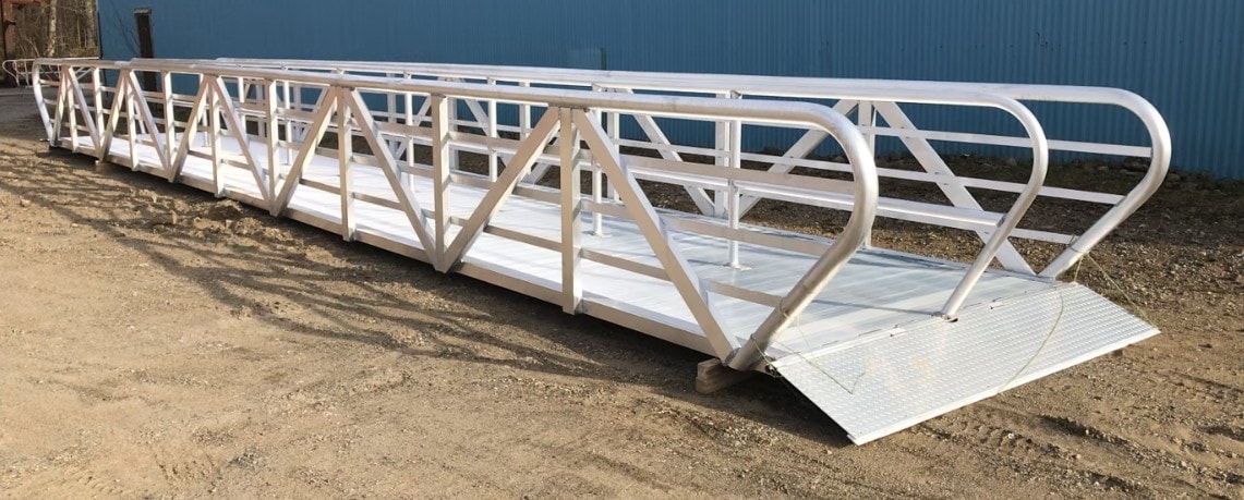 TechniDock aluminum gangway with center rail and diamond plate landing